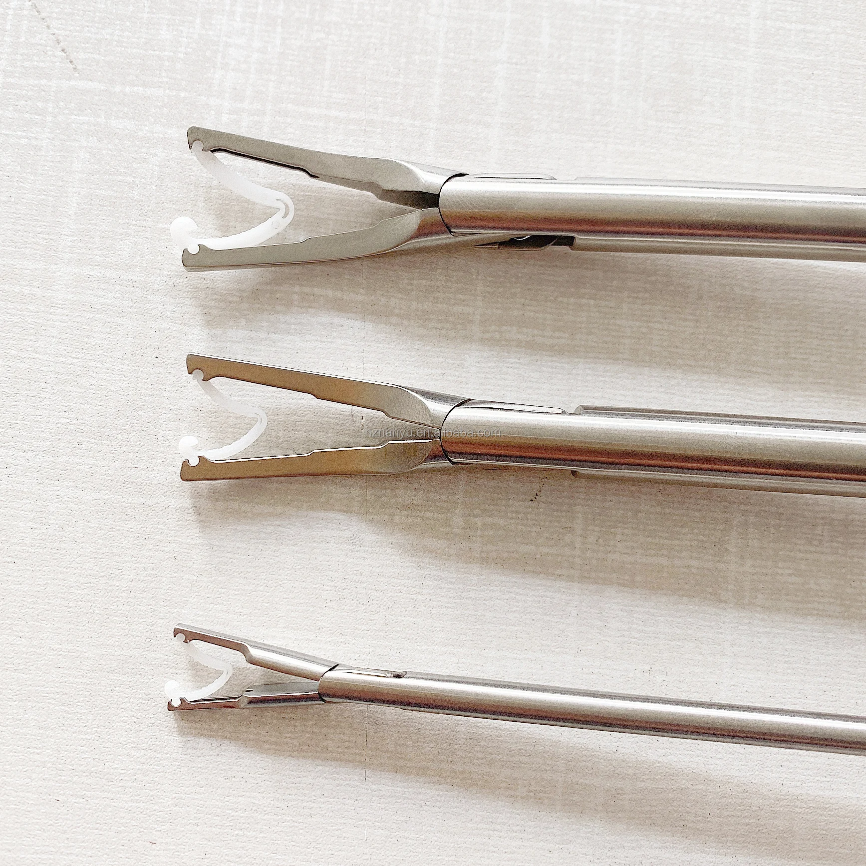 Single use medical disposable tissue closure clamp/clip  for ligation and closure of blood vessels and body cavity  tissues