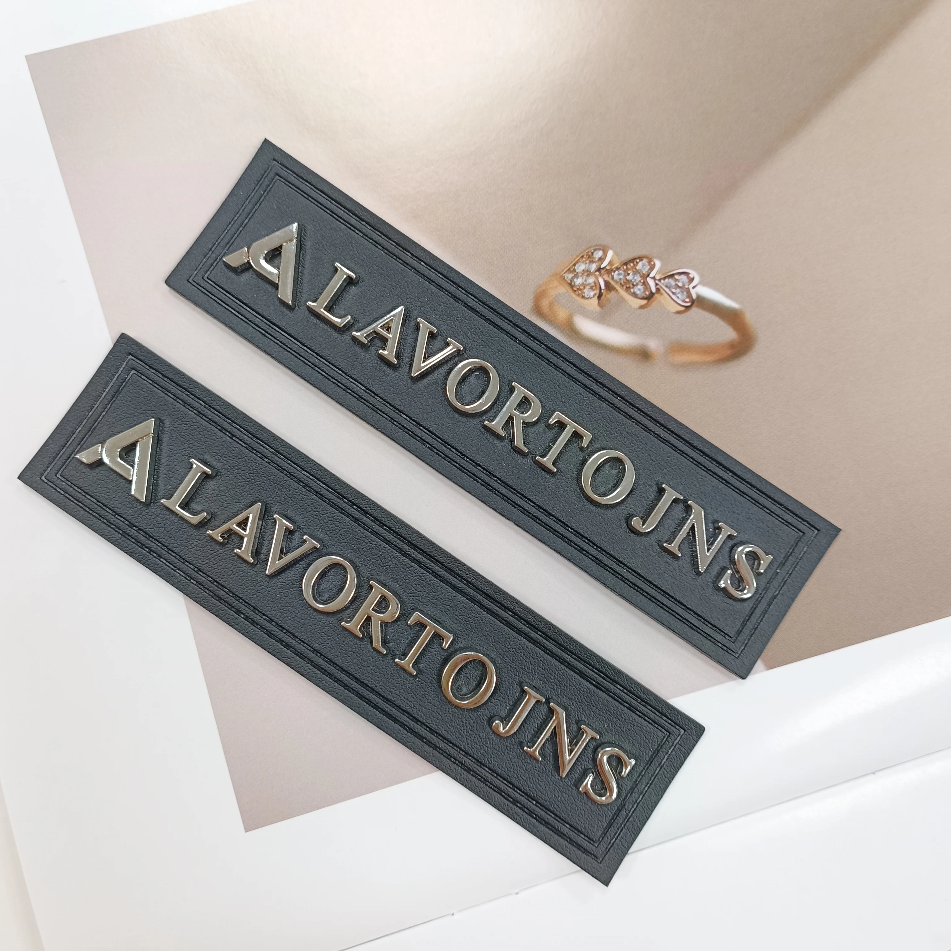 PU label design jacket clothing high-end metal label luggage leather patch silver letter leather logo label