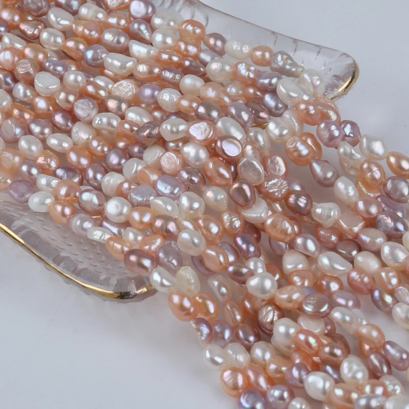 Zhuji 6-7mm White Pink Purple Natural Freshwater Baroque Shape Pearl Stand For Sale
