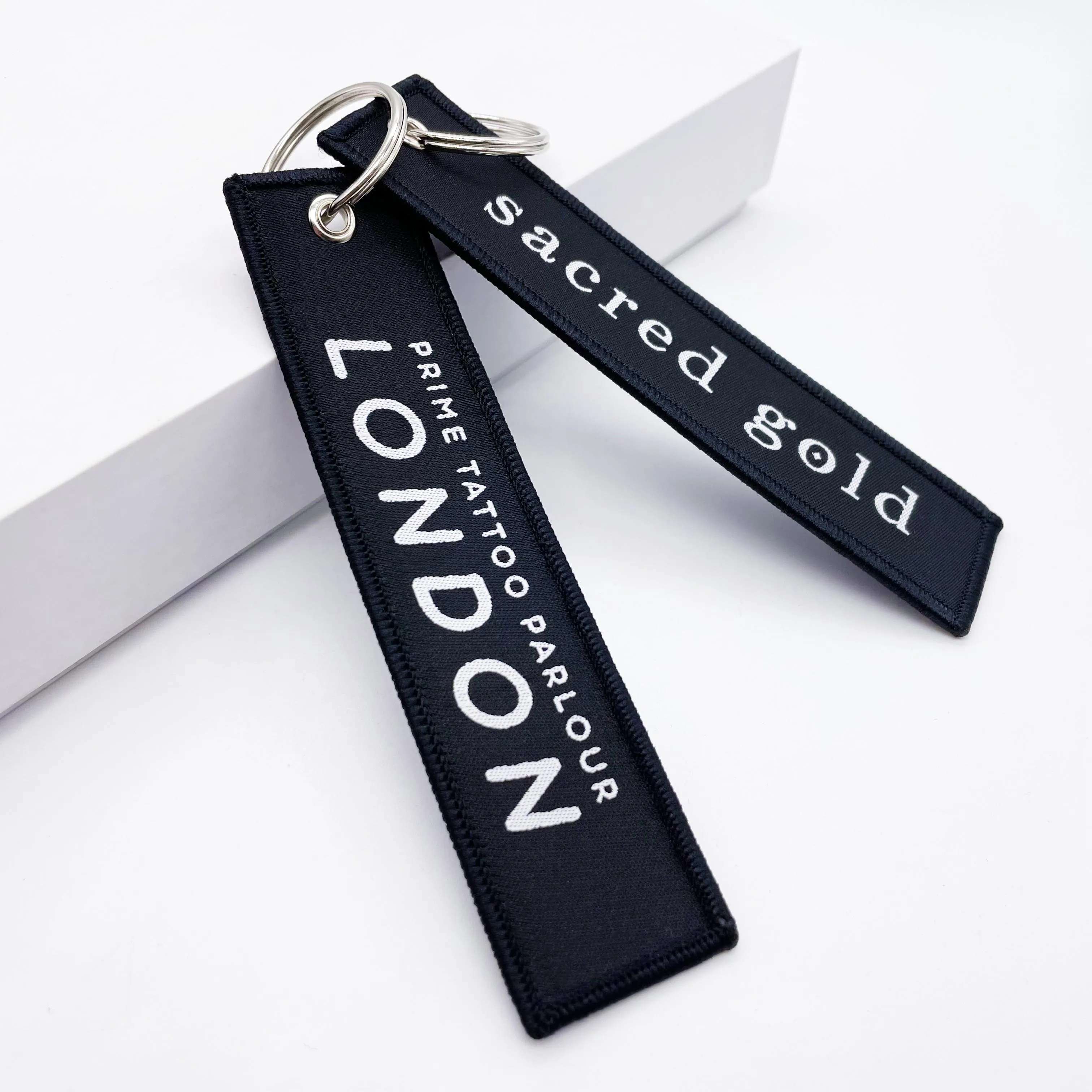wholesale custom aircraft aviation label key chain fabric Personalized Remove before you fly embroidered key chain rings