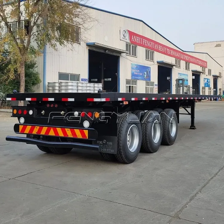 High Quality 3 Axle 20FT 40FT Flat Bed Deck Semi Trailer Good Condition Container Flatbed Semi Truck Trailers for Sale Tanzania