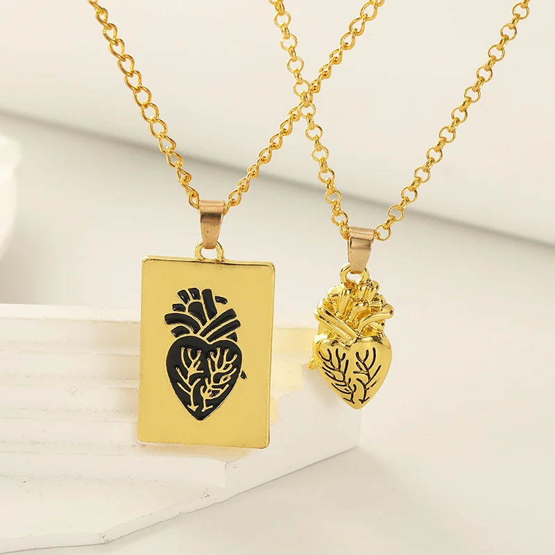New fashion personality jewelry gold heart a pair of necklace couple alloy necklace manufacturers hot sales