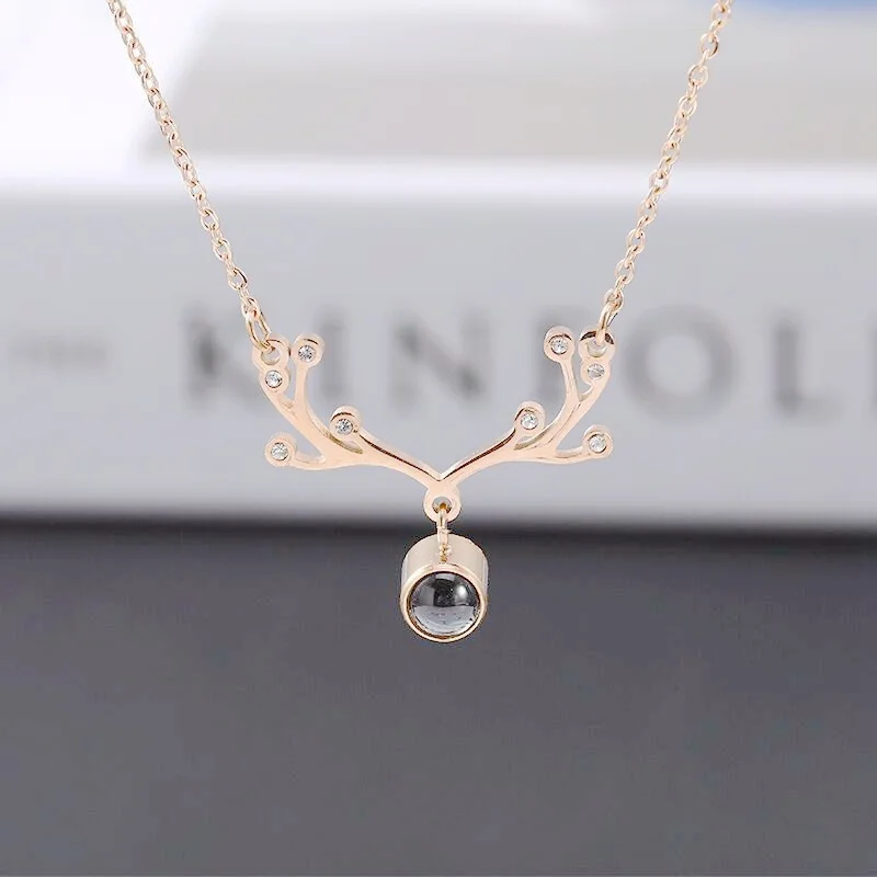 
2021 New One Deer I love You Titanium Steel Necklace Female Rose Gold Smart Deer Love Gift 100 Languages Jewelry 