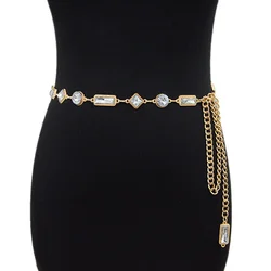 Блестящий металлический пояс с цепочкой и кристаллами