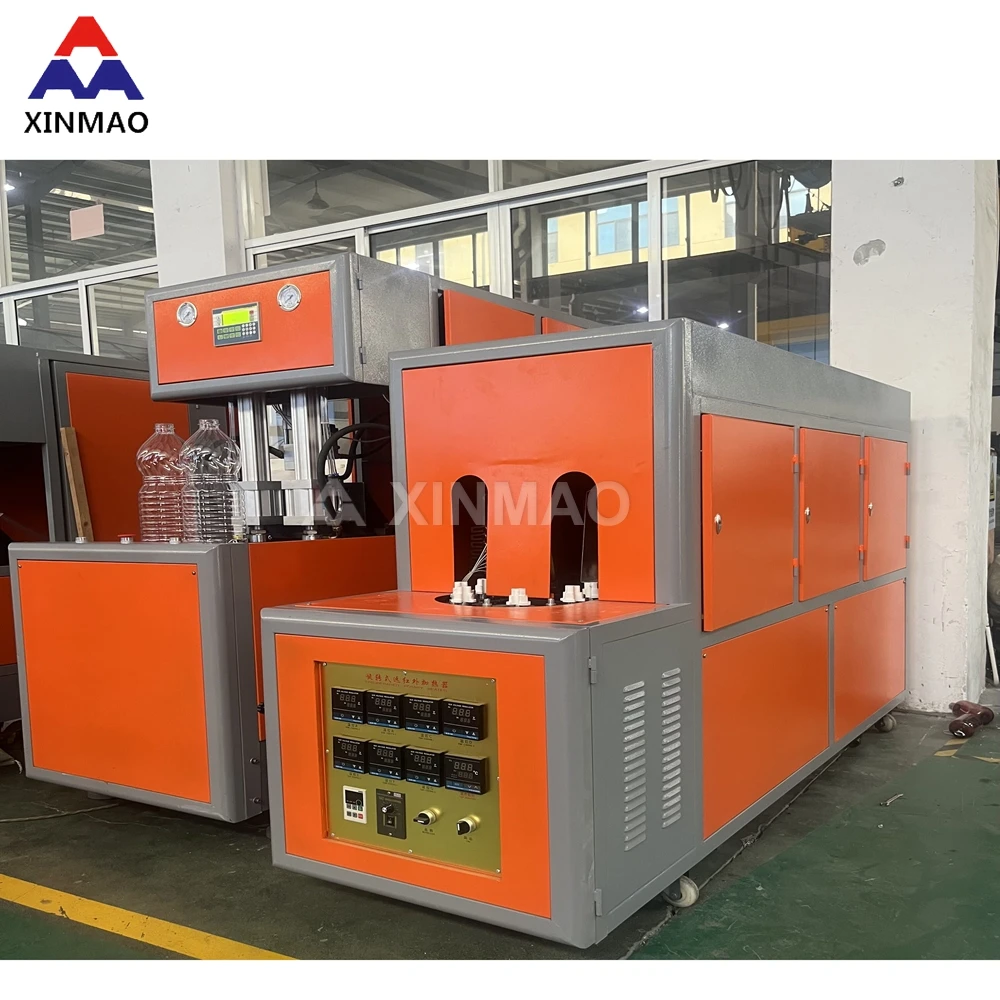 China Supplier Xinmao-1500 Semi-Auto Electric PET Bottle Blowing Machine Plastic Water Bottle Blowing Machine