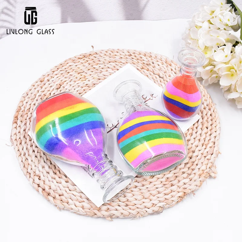 Customize a series of 40 ml to 240 ml clear decorative art  sand  glass bottle