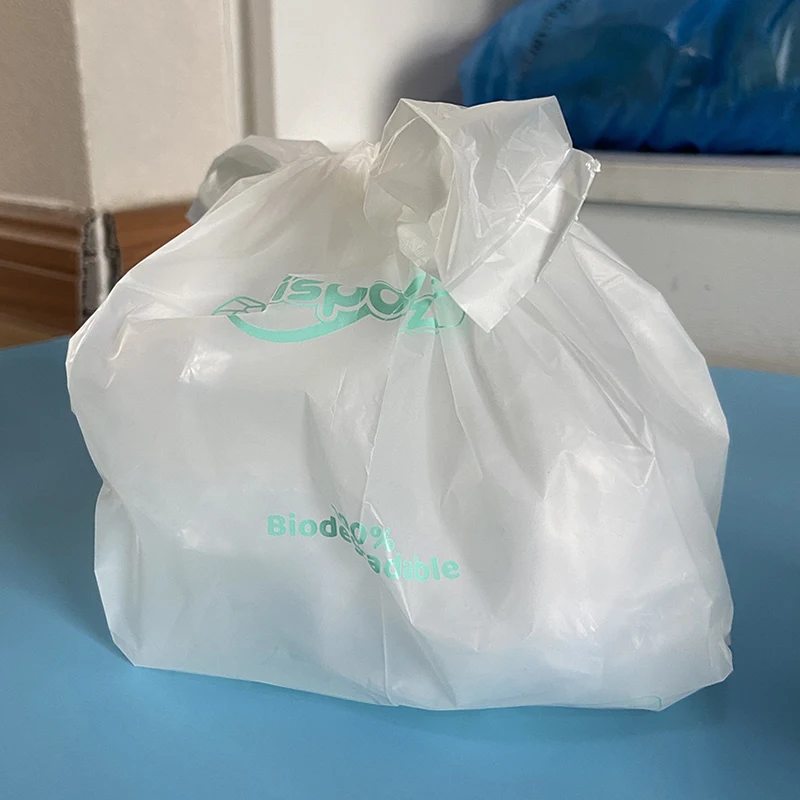 Eco friendly disposable nappy sack pe biodegradable corn starch fragrance diaper sacks plastic scent nappy bag manufacturers