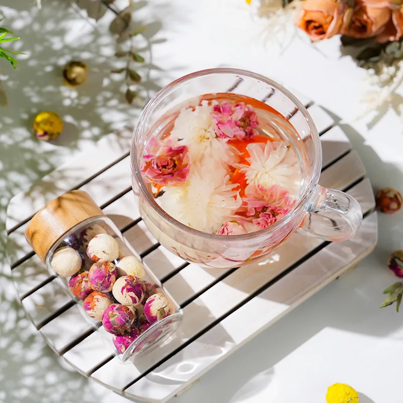 China Yunnan  handmade glass bottle packing beauty tea ball dragon pearl mixed flower tea