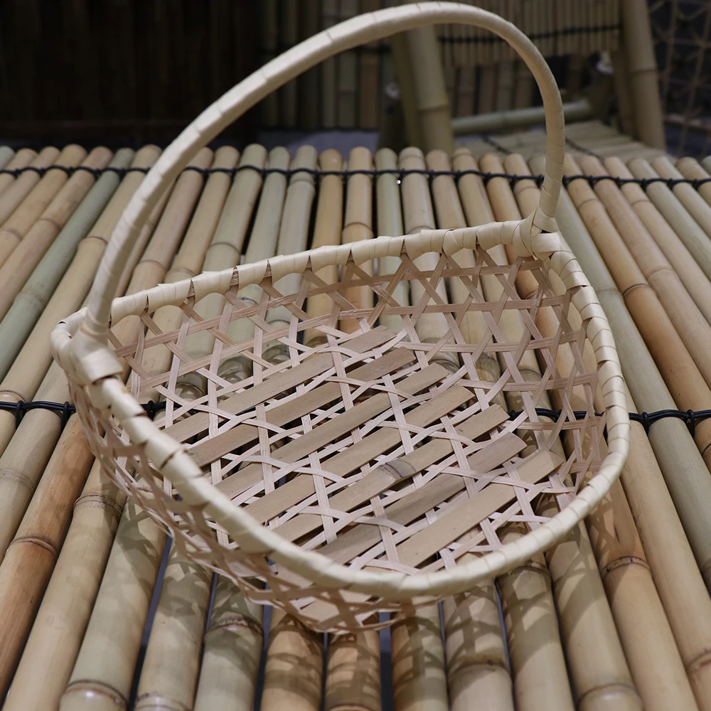 Wholesale natural irregular shape hollow decor bamboo basket weaving