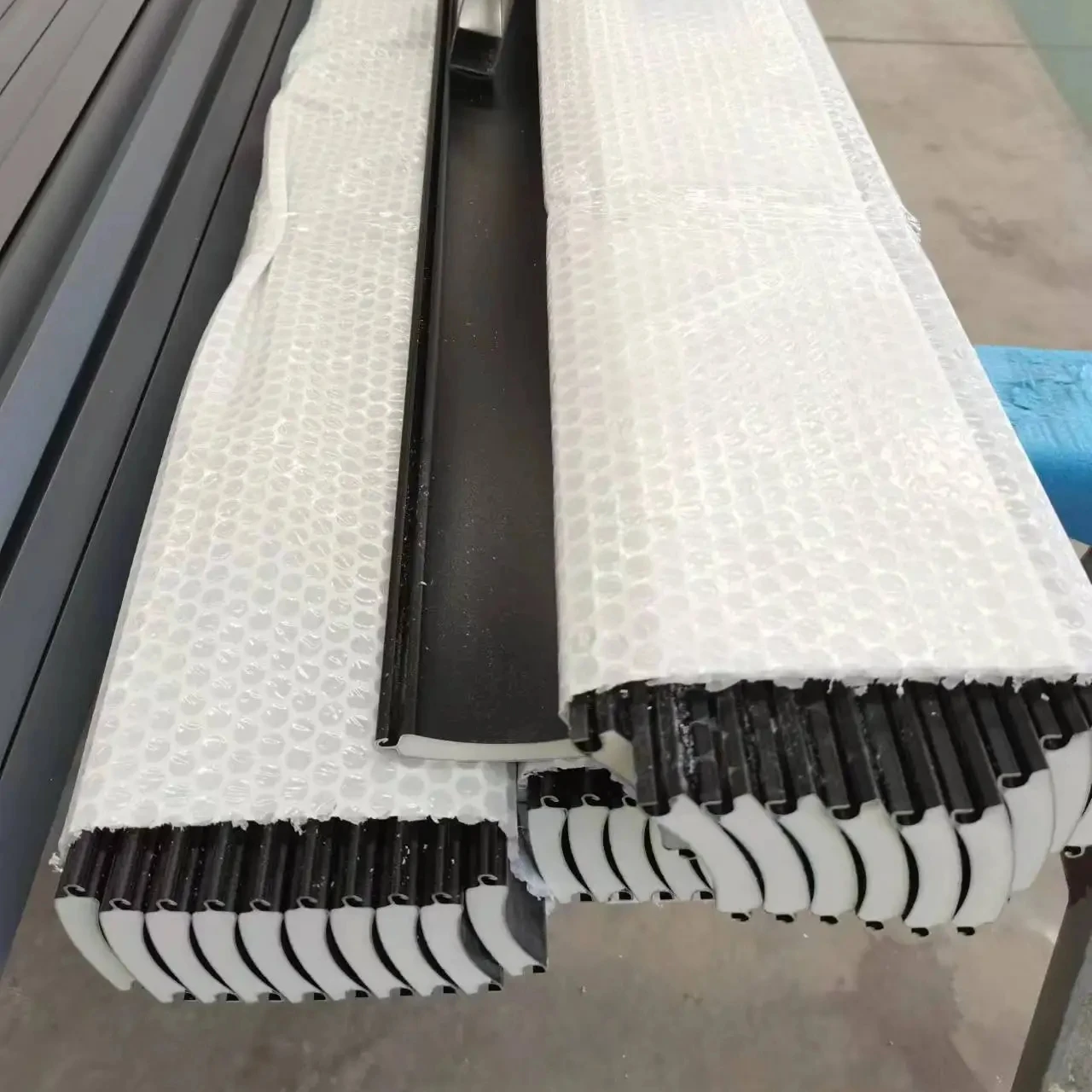 TOMA -Aluminium Double Layers Foam Slats. aluminum electric roller shutter with mini remote controller