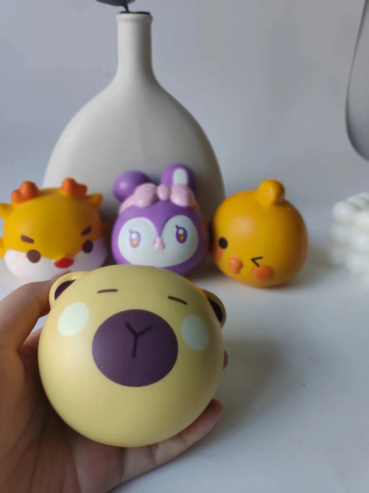 Wholesale hot selling relief popular animal head elastic rabbit chicken dragon kids squeeze PU slow rebound fidget toy