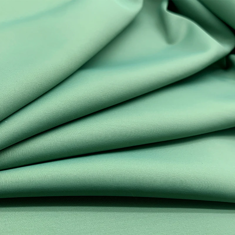 Custom plain dyed recycled Knitted 85 nylon 15 spandex  4 strech fabric for activewear swimwear yoga sportswear