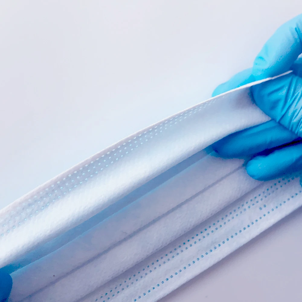 China Top 1 supplier EO disinfection manual surgical mask earloop welding machine / surgical veterinary mask