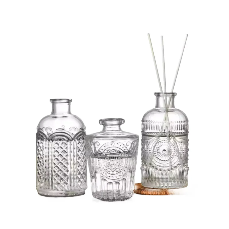 Wholesale150ml Unique Shaped Embossed Patterns Aroma Air Reed Diffuser Glass Bottle With Sticks