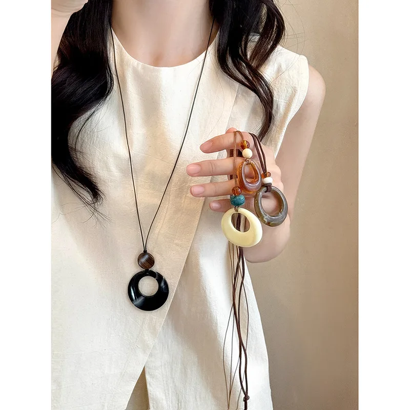 Simple resin hollow ring necklace national wind minority temperament sweater chain high-grade sense all new collarbone