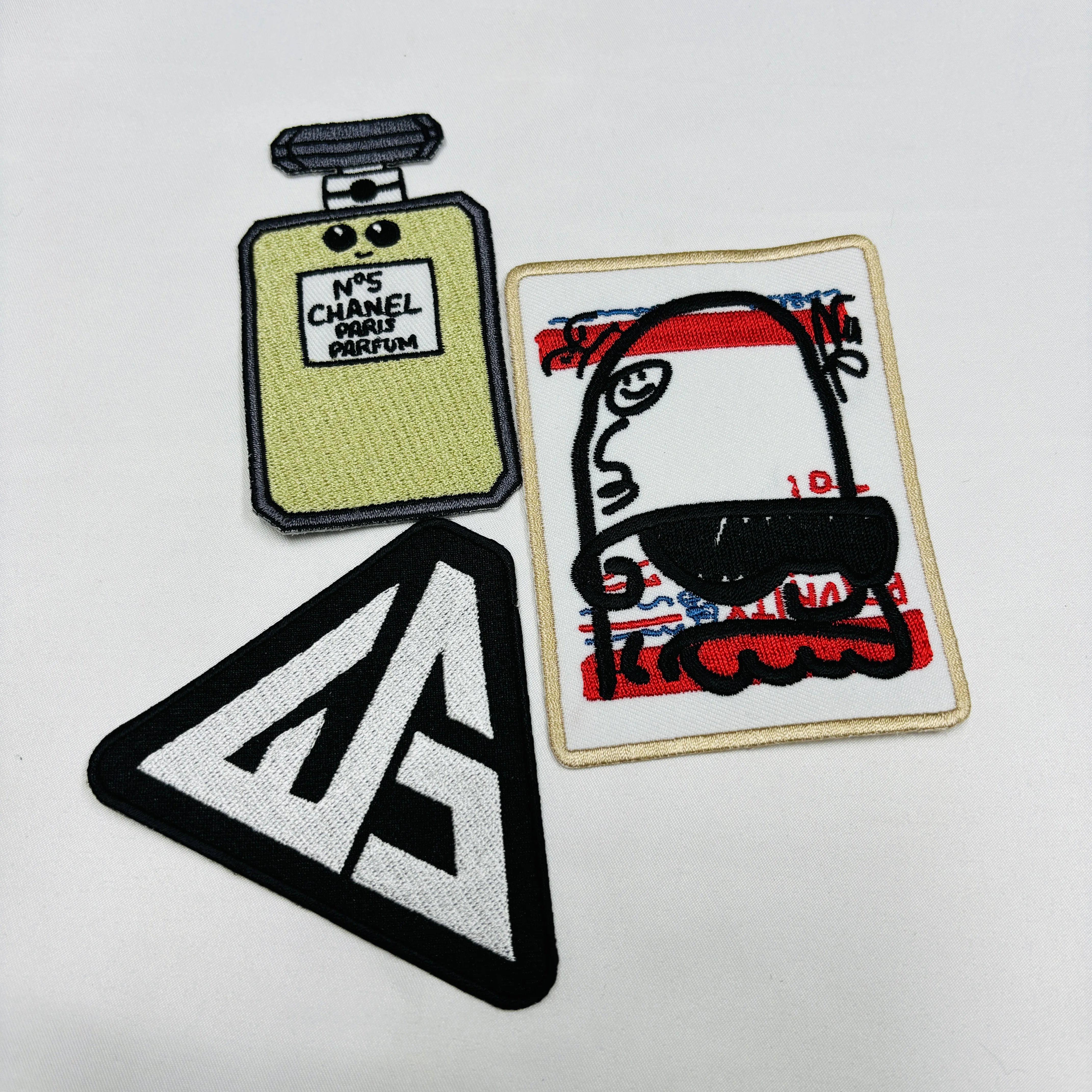 Factory Price Custom design embroidery patches iron on backing badges for clothing patches design