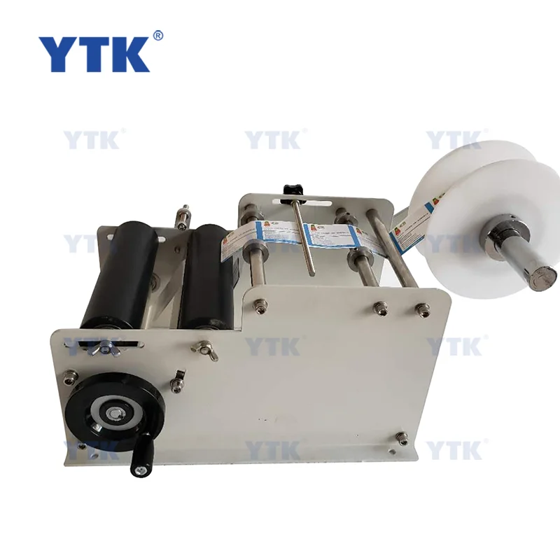 YTK-L100 Manual Pet Glass Cosmetics Round Plastic Water Bottle Wine Tin Cans Label Applicator Labeling Machine