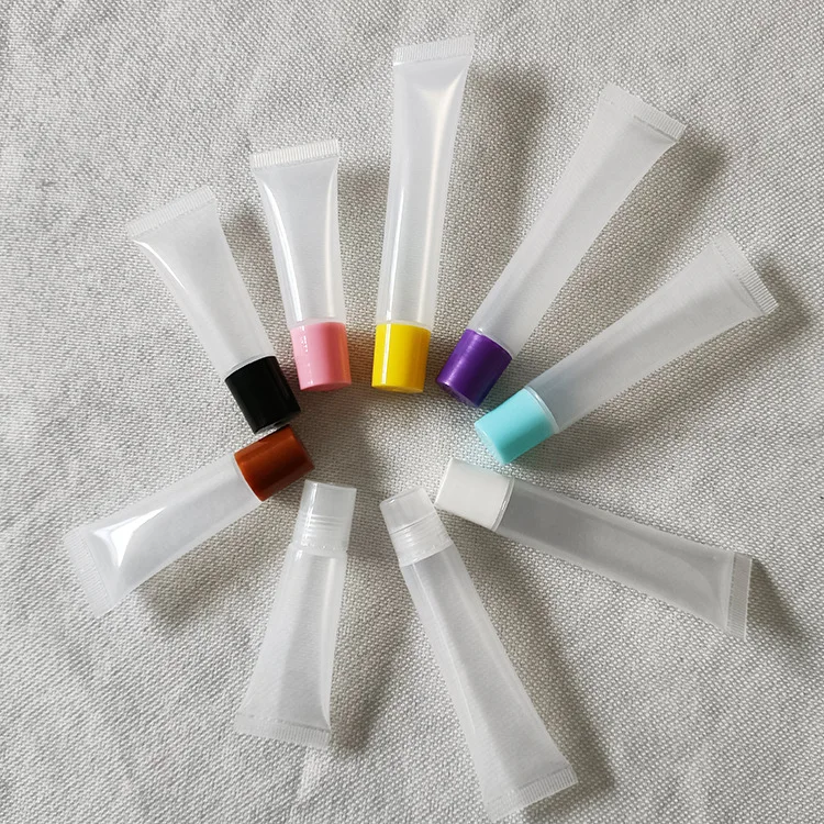 Customize latest pink 10g 15g 20g squeeze lip gloss tube private label custom empty plastic containers lip balm squeeze tubes