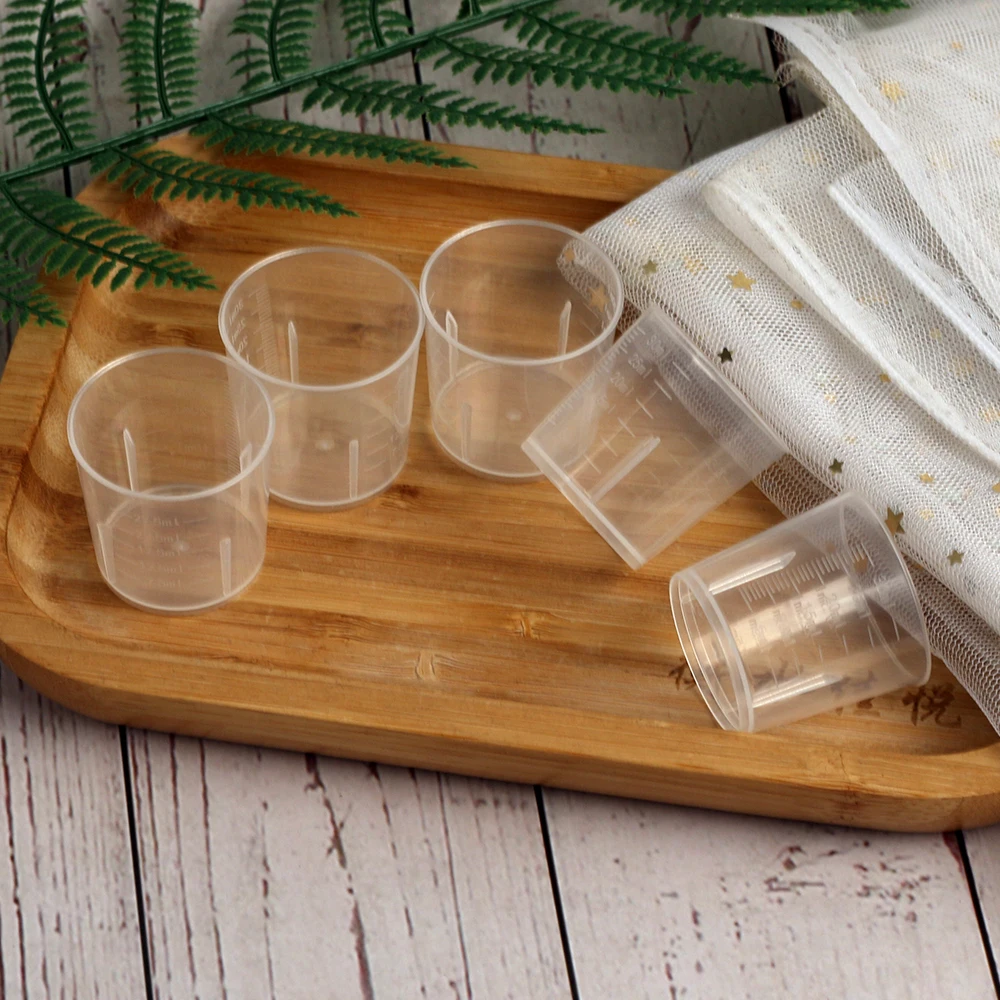 Factory wholesale 30ml plastic kitchen or laboratory measuring cups with clear scales on both sides
