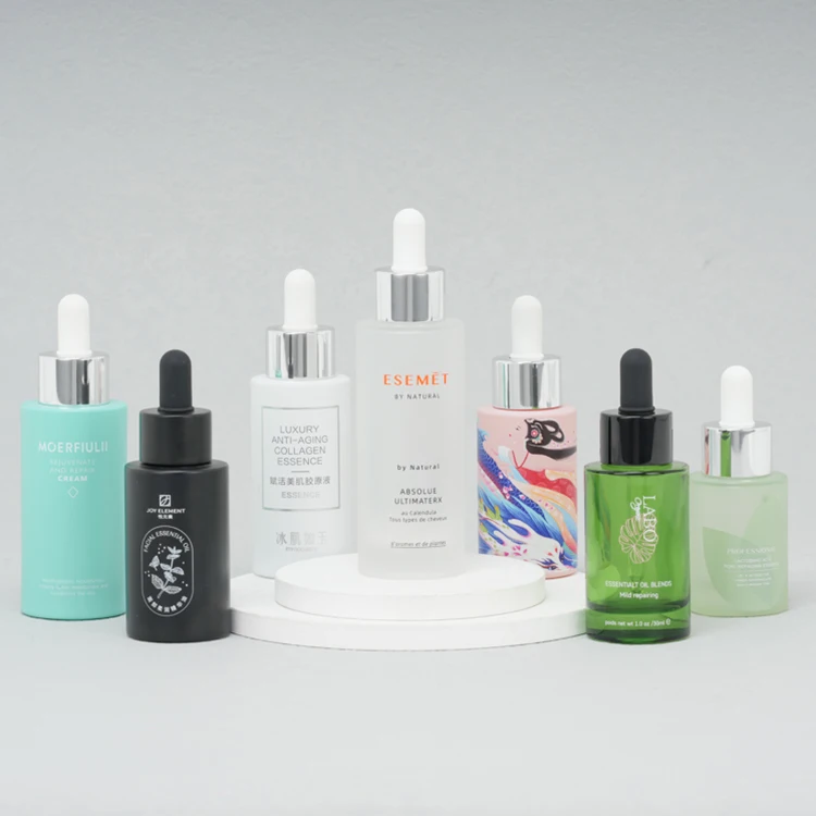 Custom 1oz 2oz 30ml 50ml 60ml Cosmetic Glass Dropper Serum Essential Oil Flat Shoulder Bottle With 30 50 60 ml and 1 2 oz