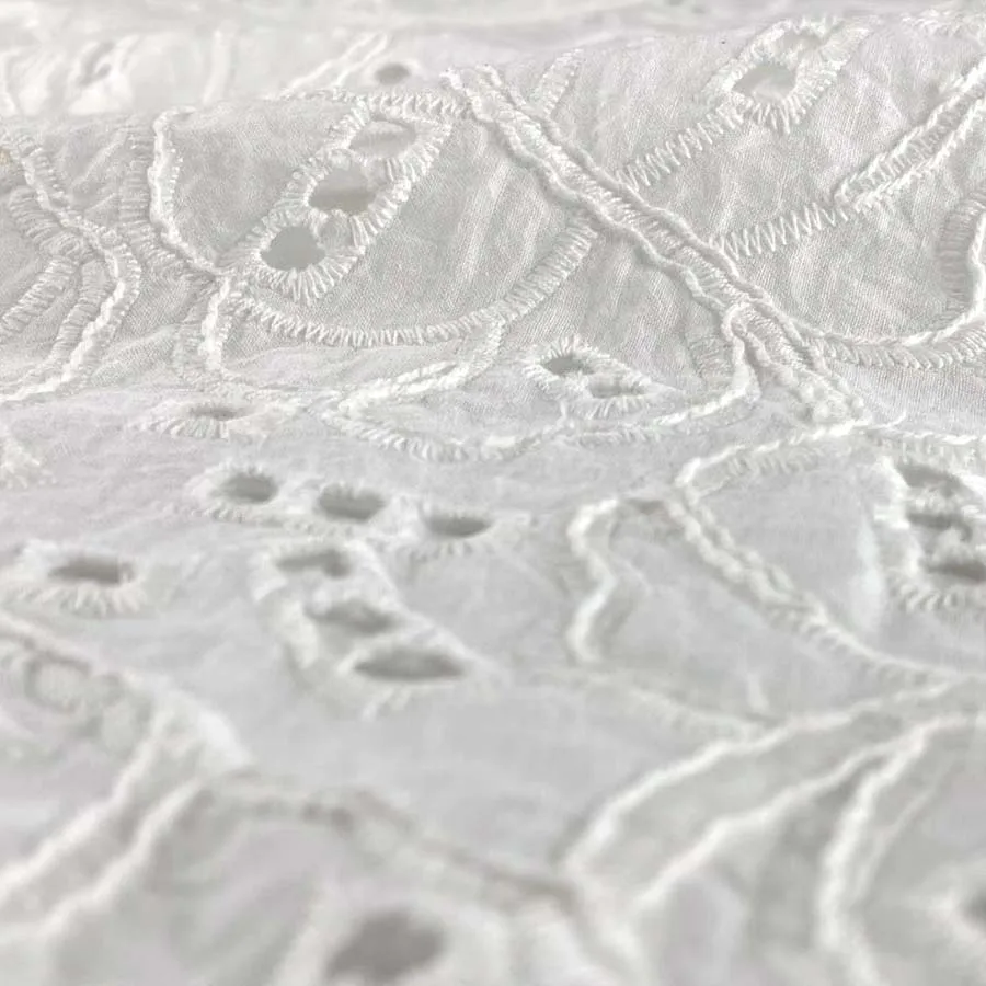 Hot Selling White Soft Machine Embroidered Eyelet Embroidery Voile Fabric for Wedding Daily Use Dress