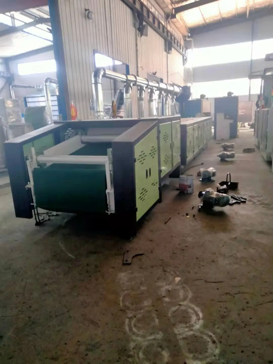 Textile waste old clothes jeans mattress scraps are recycled and opened into fibers textile recycling machine line