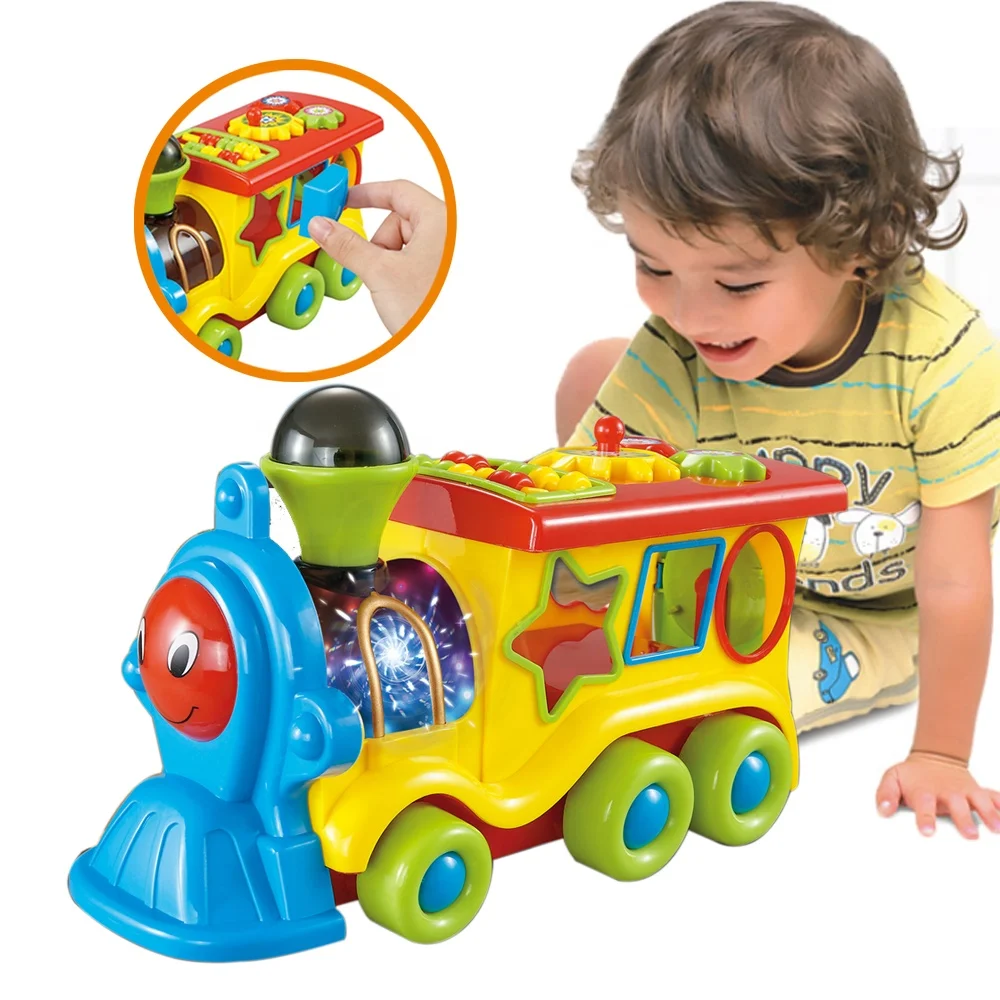Electric educational 360 degree rotation cartoon building block trains toy with light music