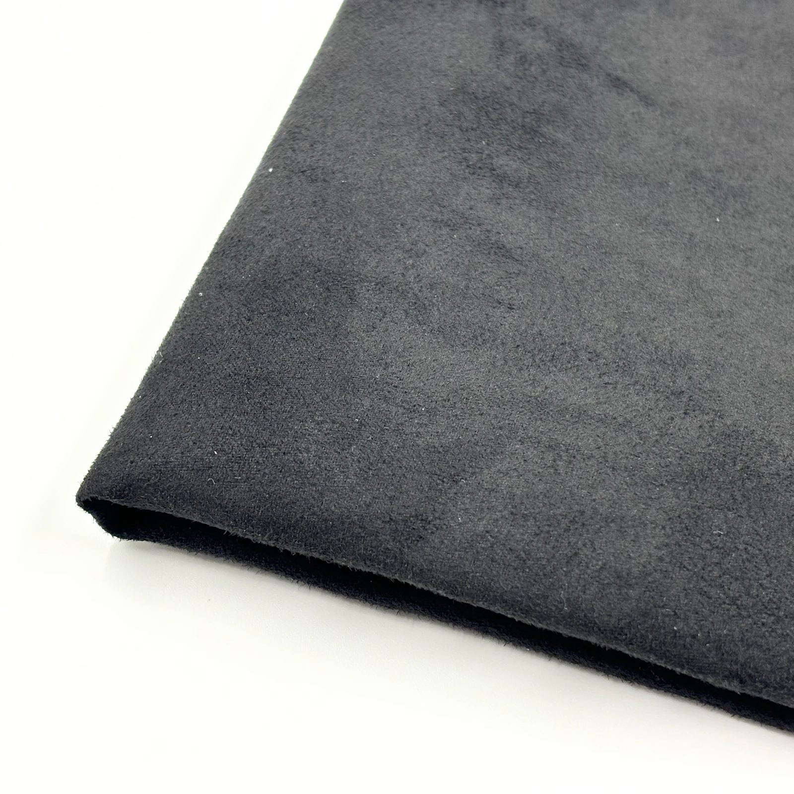 Low-Cost Wholesale 100% Polyester Black Suede Fabric for Bags Shoe Materials,and Car Seat Cushions
