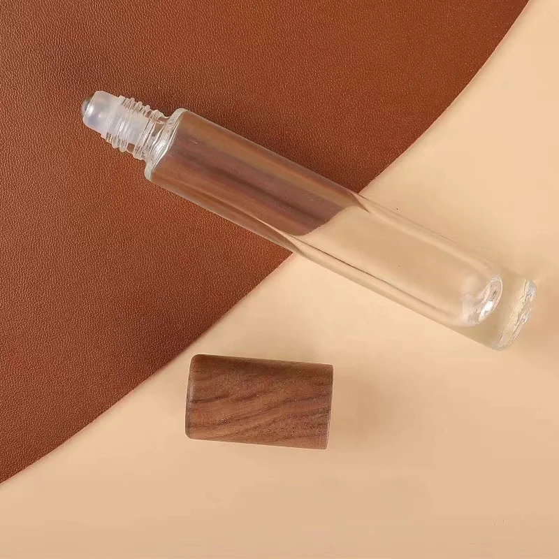 Clear glass essential oil roller bottles 10ml 15ml roller bottles for essential oils with wood cap