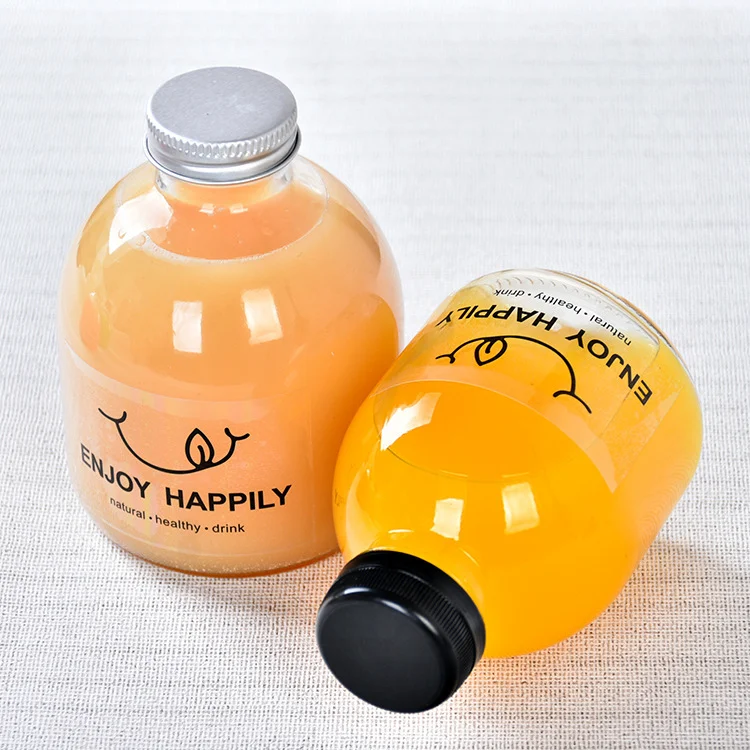 Wholesale 250ml 350ml 500ml empty fat round shape juice bottle Custom logo Spray glass drink juice bottle with anti-theft cover