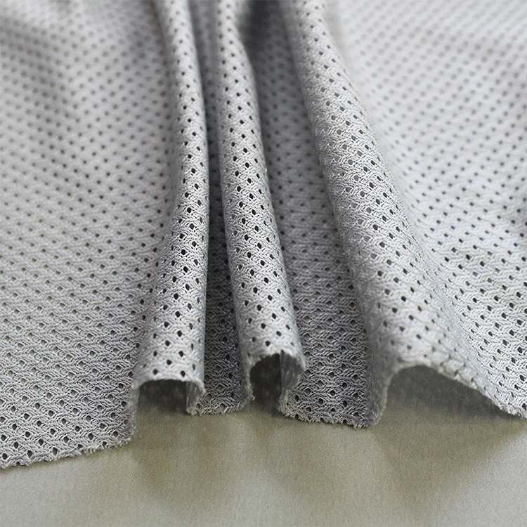 Customizable 93gsm low elastic small mesh fabric warp knitted sportswear lining material mesh fabric for clothing