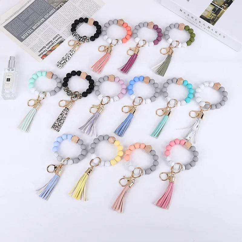 Factory wholesale custom round circle silicone bead wristlet bracelet keychain