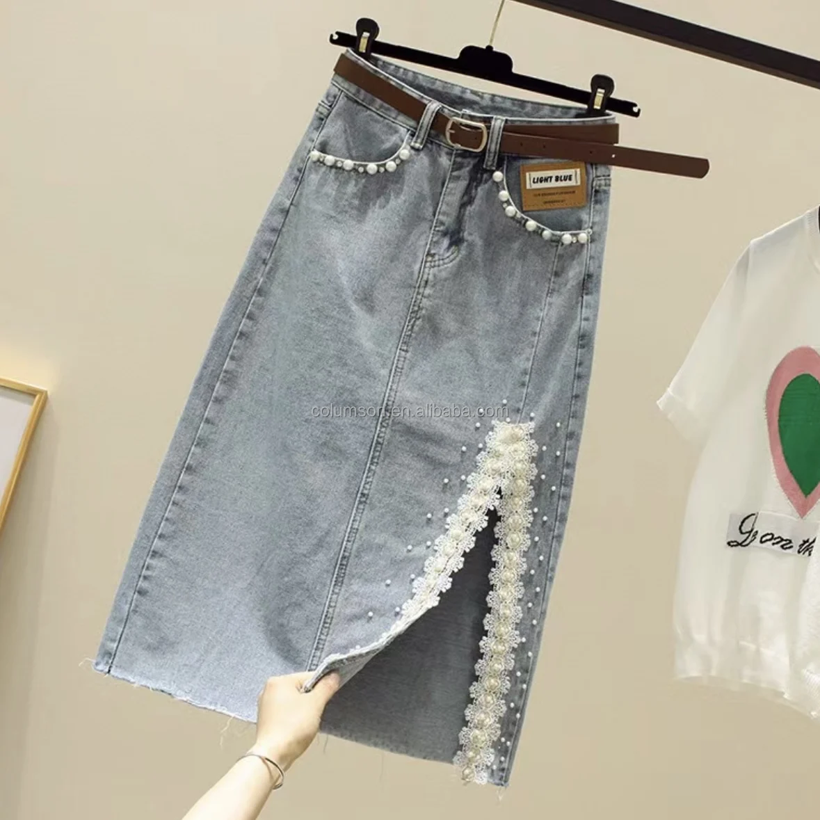 Оптовая продажа джинсовая юбка с разрезом высокой талией новая весенняя Свободная средней длины светло-голубая женская на бедрах запахом