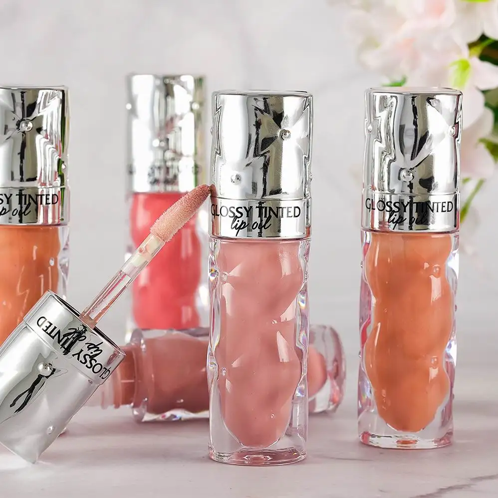 Premade Magic Low MOQ Turmeric Lemon Shea Butter Lip Oil Rose Gold Lip Tint Gloss Shimmer Moisturizing Glossy Lip Oil