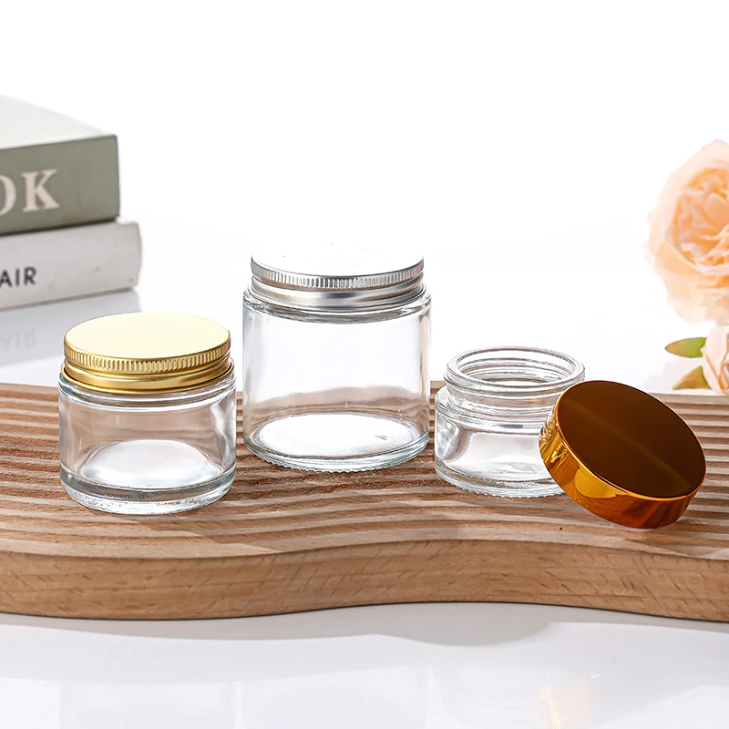New products 5g 10g 15g 30g 50g 100g matte black clear amber glass cream jar with gold black sliver aluminium Caps