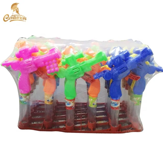 shantou wholesale mini gun shaped whistle toy candy for kids
