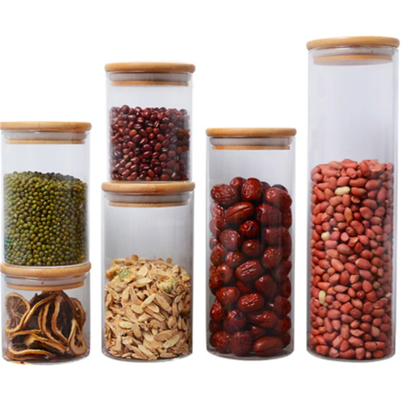 2023 Manufacturers directly supply high borosilicate round glass sealed jar kitchen storage tea jar wooden lids and spoon glass