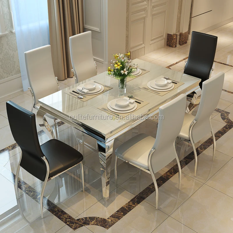 round serpentine feet metal frame dining table modern style