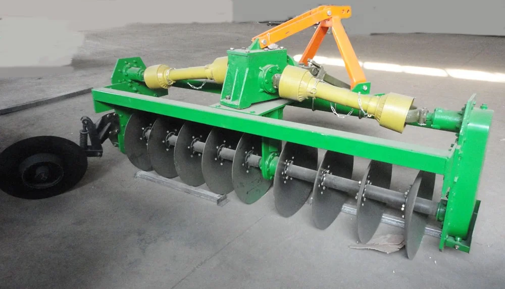 agricultural tractor rotary driven disc plough