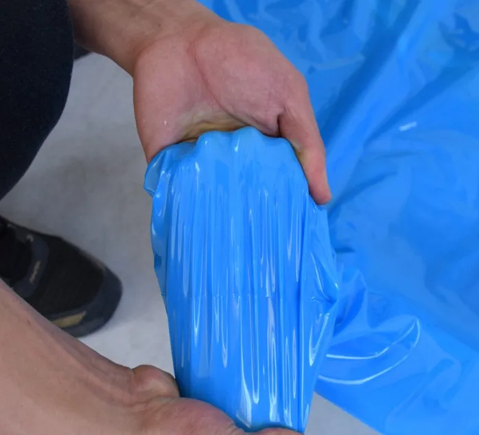 Factory wholesale fish cut long sleeve protective PPE yellow plastic TPU gown