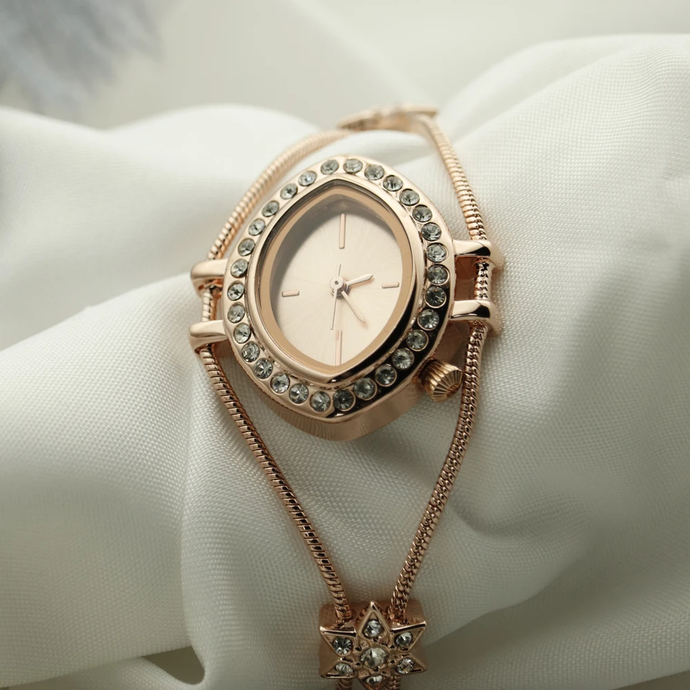 Alloy diamond lady watch top brand custom eyes special shape new style popular luxury OEM wholesale women girls watch in bulk