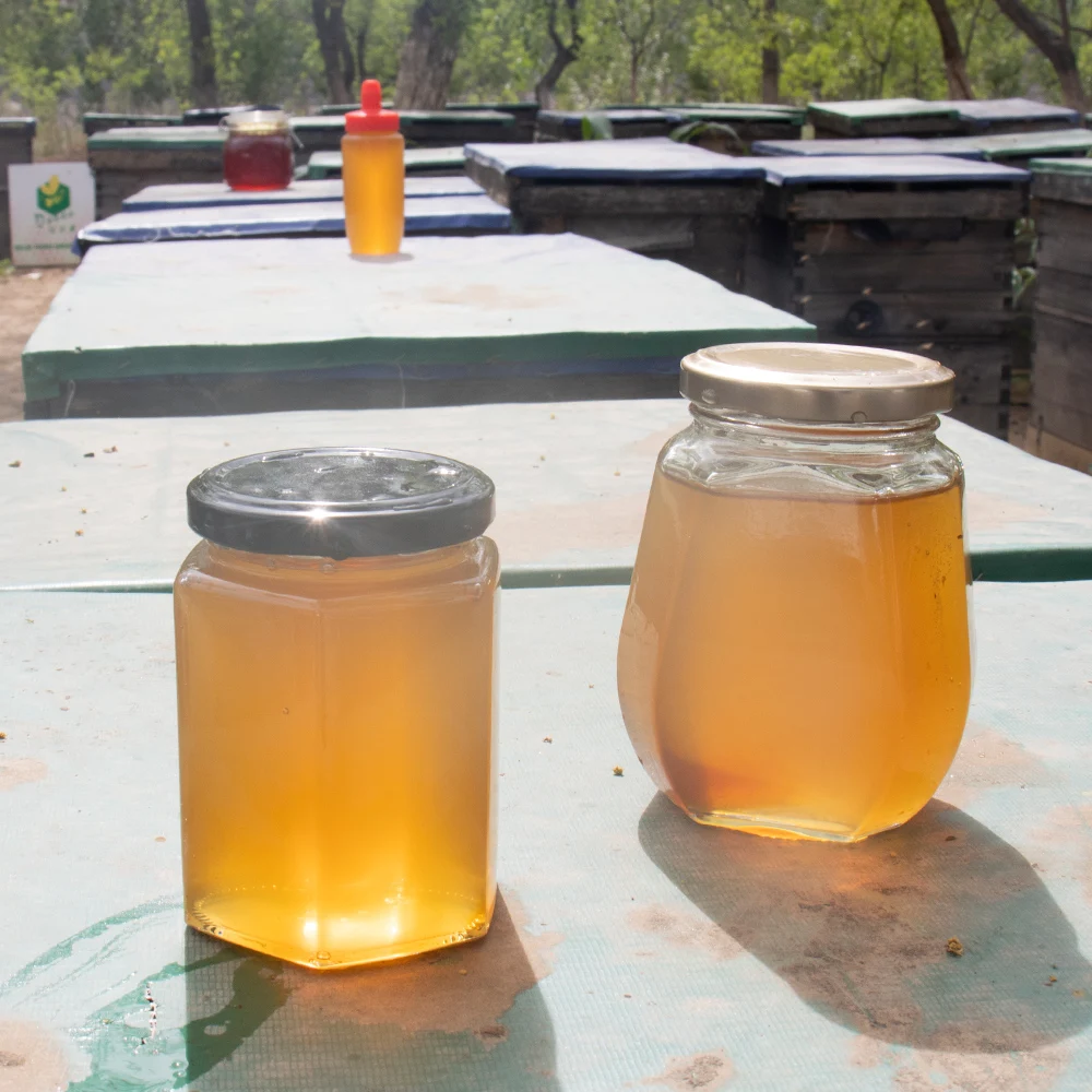 Factory Price Bulk Organic Mountain Raw Natural Honey Miel Amber Honey Jar Royal Honey Natural Flower Mason Jar Packaging 0.25