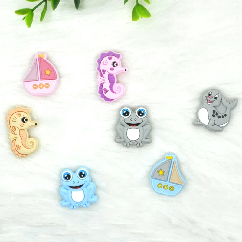 Best selling Funny diy keychain brand designer logo animal silicone focal beads for pens focal beads