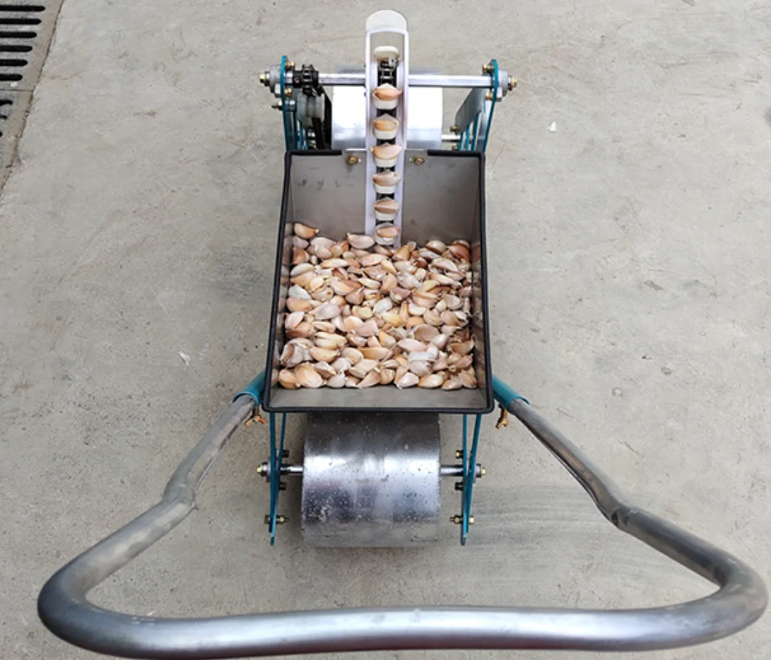 Hand push single row manual  garlic seeder corn planter for sale