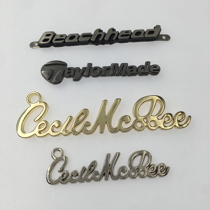 
Custom Black Engraved Embl Alphabet Saint Lairent Metal Logo On Label On Bags 