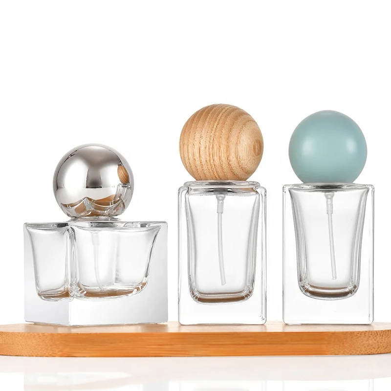 Hot Sale High Quality Custom 30ml 50ml Empty Clear Glass Perfume Bottle With Pump And Wood Cap