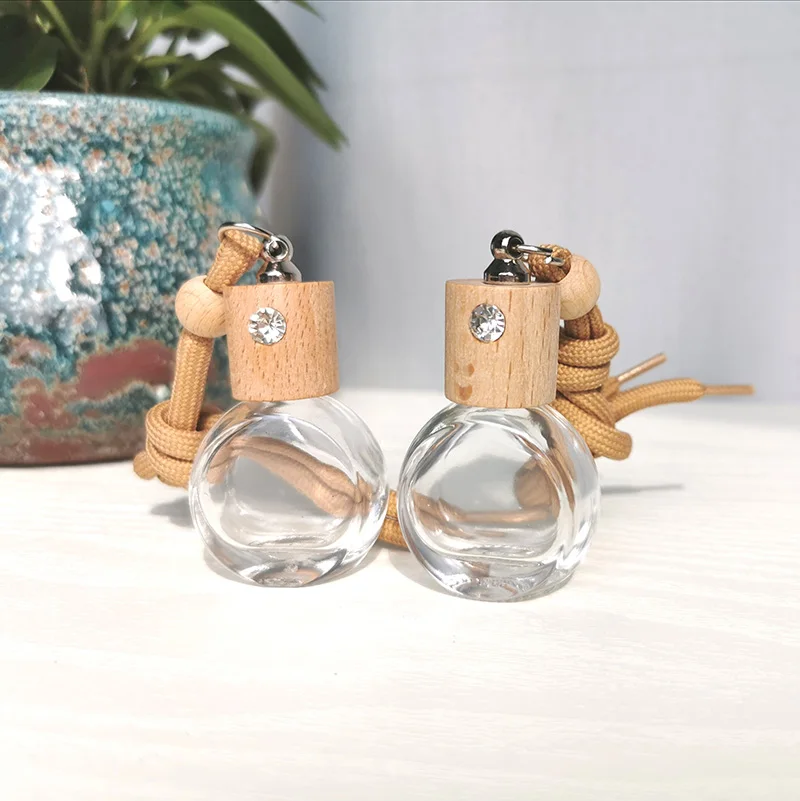 Avertan wholesale 8ml Round shape  High Car Diffuser Perfume Glass Bottle With Hanging Ropes