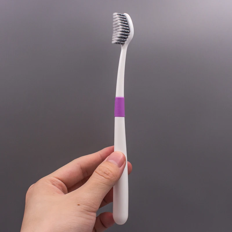2024 High Quality Toothbrush Special Head Adult Toothbrush Wholesalers Anti-slip Handle Toothbrush with Curved Bristles