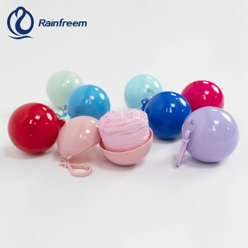 Logo Custom Portable Disposable Waterproof Compression Poncho Raincoat in Keychain Printed Pocket Balls for Adults Kids