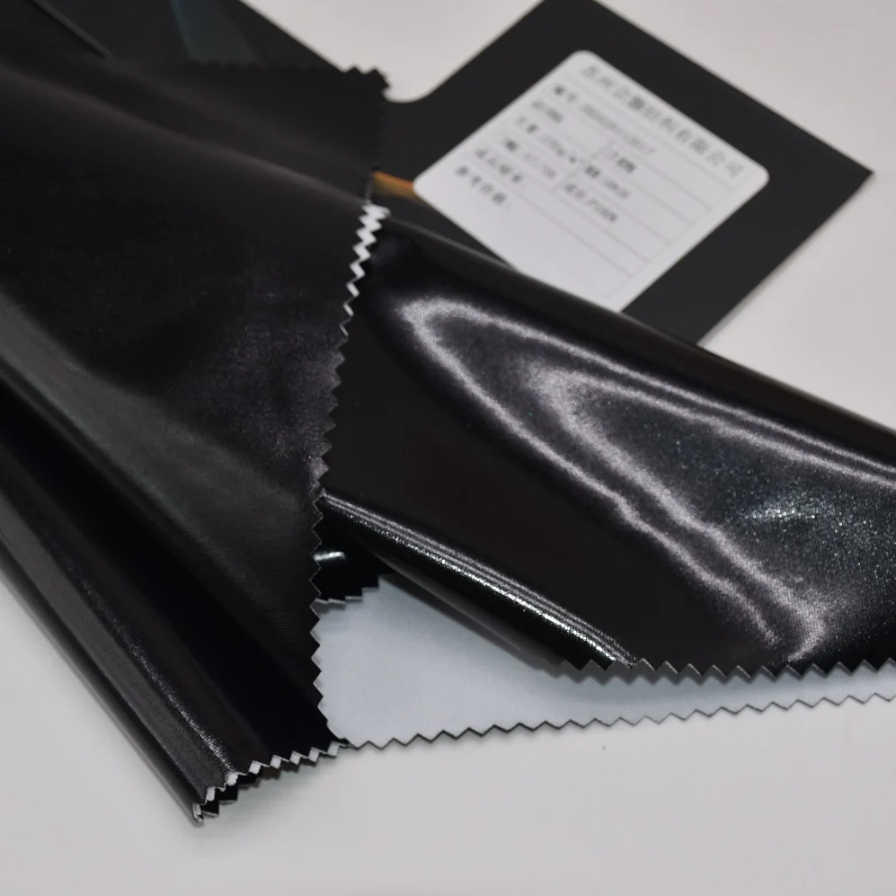 Polyester knitted fabric high elastic PU imitation leather release paper transfer coating fabric